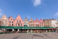 BRUGES, BELGIUM - MARCH 23, 2015. Tourists in north side of Grote Markt (Market Square) of Bruges, Brugge, with enchanting street Royalty Free Stock Photo