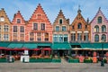 Bruges Grote markt square famous tourist place with many cafe and restaurants