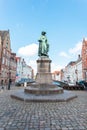 Monument of famous artist Jan Van Eyck on Square Jan van Eyckplein in Bruges, Belgium. Royalty Free Stock Photo