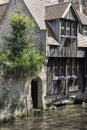 Picturesque view of water channels of the city near Beguinage Houses (Begijnhof), Bruges, Belgium Royalty Free Stock Photo