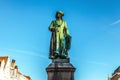 Bruges, Belgium. Medieval scenery with Yan Van Eyck square and statue. Brugge, Western Flanders.