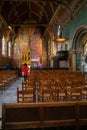 Bruges, Belgium - 03-01-2020.Tourist visit interior of the Basilica of the Holy Blood - Basiliek van het Heilig Bloed. Royalty Free Stock Photo