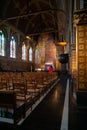 Bruges, Belgium - 03-01-2020. Tourist visit interior of the Basilica of the Holy Blood - Basiliek van het Heilig Bloed. Royalty Free Stock Photo