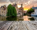 Bruges Brugge cityscape with water canal at sunset