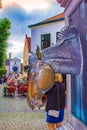 Picturesque horse head fountain at street in Bruges historic center Belgium Royalty Free Stock Photo