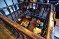 Bruges, flanders, Belgium. August 2019. Interior of the historic de garre brewery. The wooden beams, the furniture, the brick Royalty Free Stock Photo