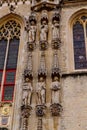 Bruges, Flanders, Belgium, Europe - October 1, 2019. Details of facades medieval old brick houses on the ancient streets in Royalty Free Stock Photo