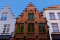 Bruges, Flanders, Belgium, Europe - October 1, 2019. Details of facades medieval old brick houses on the ancient streets in Royalty Free Stock Photo