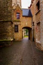 Bruges, Flanders, Belgium, Europe - October 1, 2019. Medieval ancient houses made of old bricks on ancient medieval street in Royalty Free Stock Photo