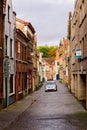 Bruges, Flanders, Belgium, Europe - October 1, 2019. Medieval old brick houses on the ancient streets in  Bruges Brugge in Royalty Free Stock Photo