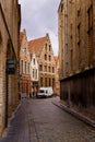 Bruges, Flanders, Belgium, Europe - October 1, 2019. Medieval old brick houses on the ancient streets in  Bruges Brugge in Royalty Free Stock Photo