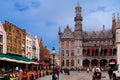 Bruges, Flanders, Belgium, Europe - October 1, 2019. Unknown people on the medieval ancient Market Place Market Square in