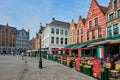 Bruges Grote markt square famous tourist place with many cafe and restaurants