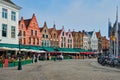 Bruges Grote markt square famous tourist place with many cafe and restaurants