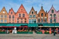 Bruges Grote markt square famous tourist place with many cafe and restaurants