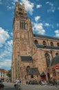 St. Salvator`s Cathedral, people and bikes in Bruges. Royalty Free Stock Photo
