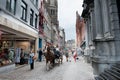 Bruges, Street with typical horse cart