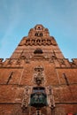 Brugge Belfry tower facade details at Grote markt square in Bruges, Belgium on sunset Royalty Free Stock Photo