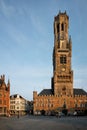 Brugge Belfry tower and Grote markt square in Bruges, Belgium on sunset Royalty Free Stock Photo