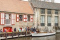 BRUGGE, BELGIUM - APRIL 22: Boat tour into the can Royalty Free Stock Photo