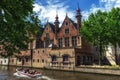 Tourist boat on canal Spiegelrei, Bruges, Belgium Royalty Free Stock Photo