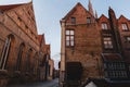 beautiful traditional architecture on historical street of brugge, belgium Royalty Free Stock Photo