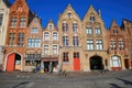 View on medieval houses with stepped gable roof against clesr blue summer sky