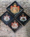 Four family coat of arms at Jerusalem Church, Bruges Belgium. Royalty Free Stock Photo