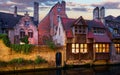 Brugge. Medieval houses over canal in Bruges Belgium evening landscape panorama with vintage architecture blue sky and reflection Royalty Free Stock Photo