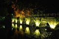 Brugge night view with a canal and old bridge, Belgium