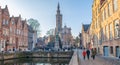 Brugge, West Flanders Belgium - December 2018: Spiegelrei canal, Jan Van Eyck Square and Poortersloge The Burghers` Lodge Royalty Free Stock Photo