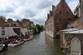 Tourists boats in a canal of Bruges.