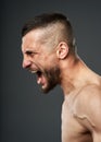 Bruised fighter on gray background Royalty Free Stock Photo