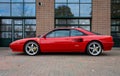 Red Ferrari Mondial T coupe 1989 at The Gallery Brummen