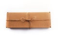 The brun squared present box with jute rope on a white background Royalty Free Stock Photo