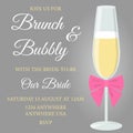 Brunch and bubbly. Bridal shower invitation with a glass of champagne and pink bow on grey background.