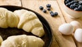 Brunch with fresh bread, eggs and blueberry