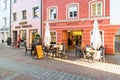 The main street with bars and shops in the historic center of Bruneck, Italy