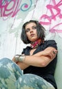 Brunet woman sitting in old house