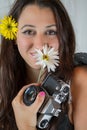 Brunette Amongst Flowers and Vintage Camera