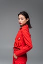 brunette asian model in red jacket Royalty Free Stock Photo