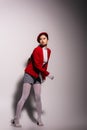 Brunette asian model in stylish red Royalty Free Stock Photo