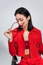 brunette asian woman in red jacket Royalty Free Stock Photo