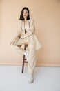 brunette asian woman in stylish pantsuit Royalty Free Stock Photo