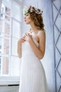 Brunette bride in fashion white wedding dress with makeup Royalty Free Stock Photo