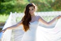 Brunette bride in fashion white wedding dress with makeup Royalty Free Stock Photo