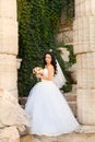 Brunette bride in a white dress on the wedding day Royalty Free Stock Photo