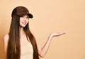 Sexy beautiful brunette woman in a brown suede baseball cap Royalty Free Stock Photo