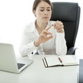 Brunette business woman file nails while work Royalty Free Stock Photo