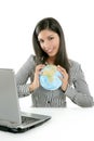 Brunette businesswoman with global map Royalty Free Stock Photo